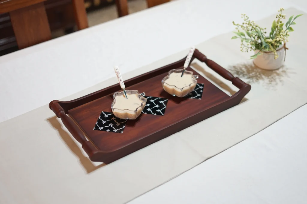 wooden tray for serving elegantly with handles and ceramic tile inlay curated by our home decor store in kerala