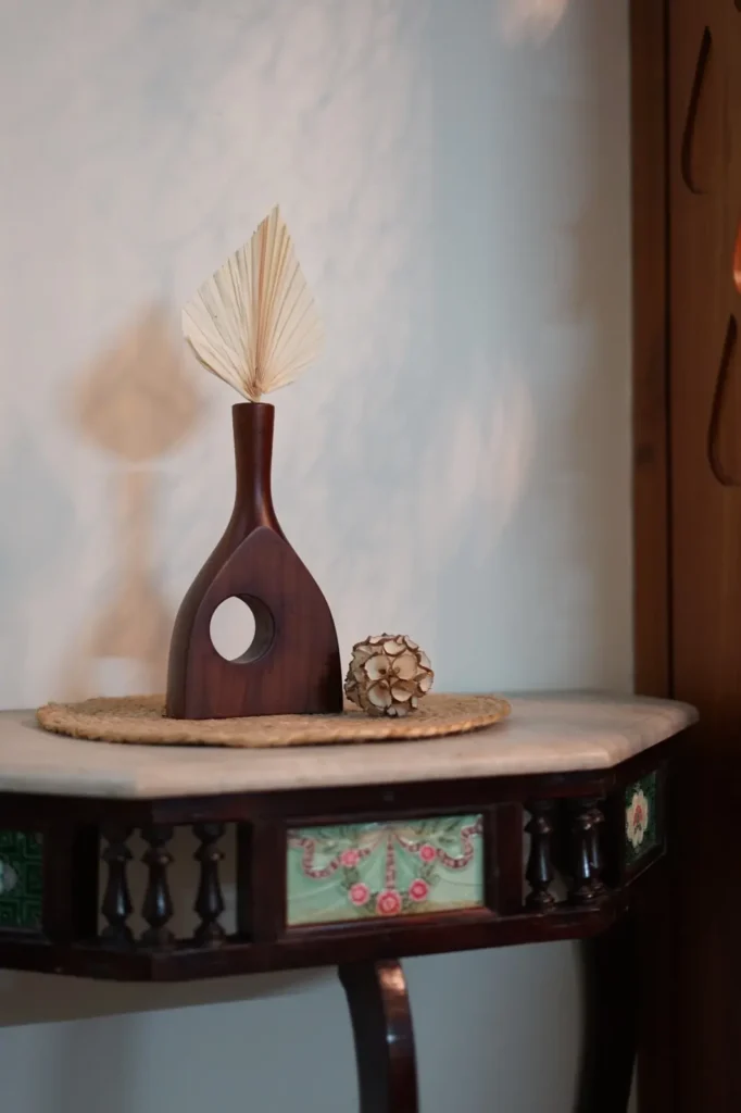 wooden vase in mahogany for table decor