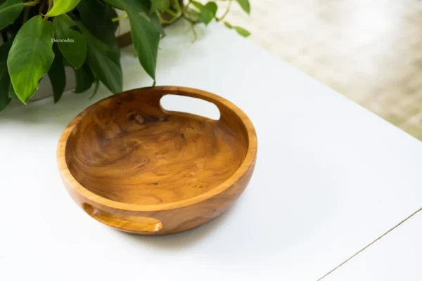 wooden bowl made of solid teak is a modern home decor item for tabletops