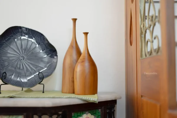 set of two vases in wood with nrrow neck for enhancing home decor style.